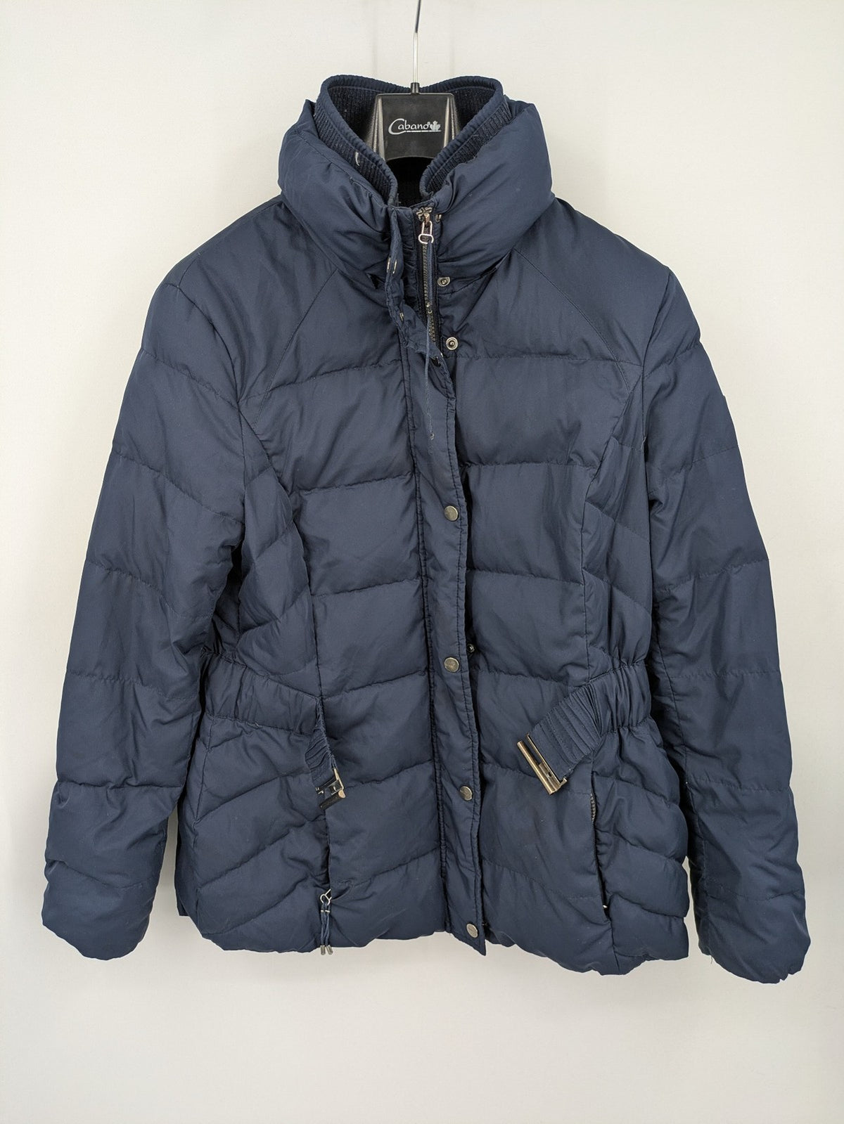 Esprit navy puffer jacket with belt, high collar, ribbed inner lining, and button placket.