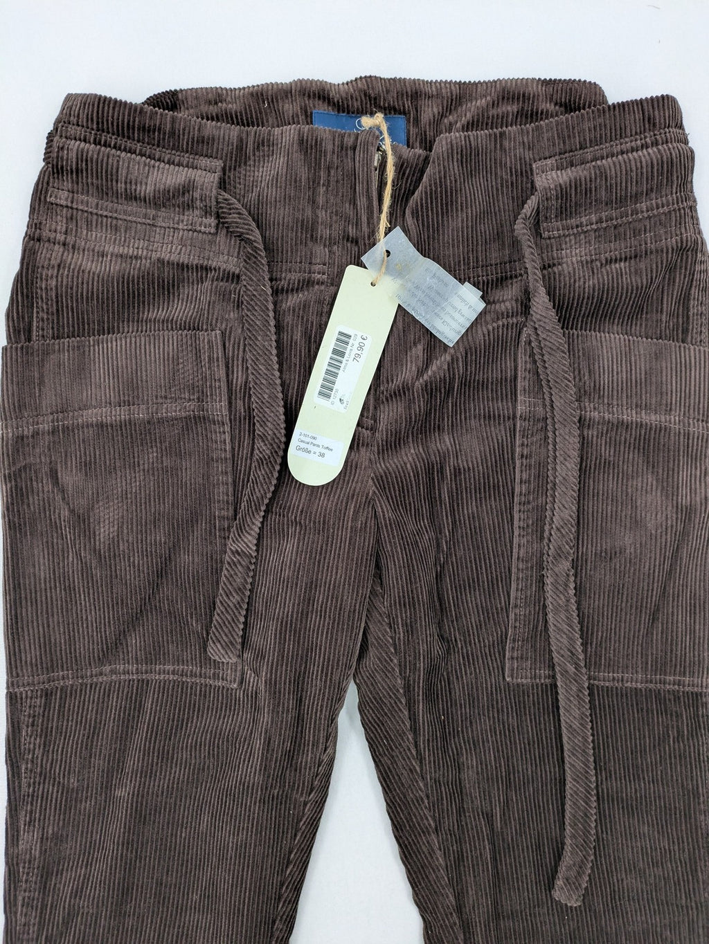 Alma & Lovis brown cord pants with drawstring, casual fit, and patch pockets.
