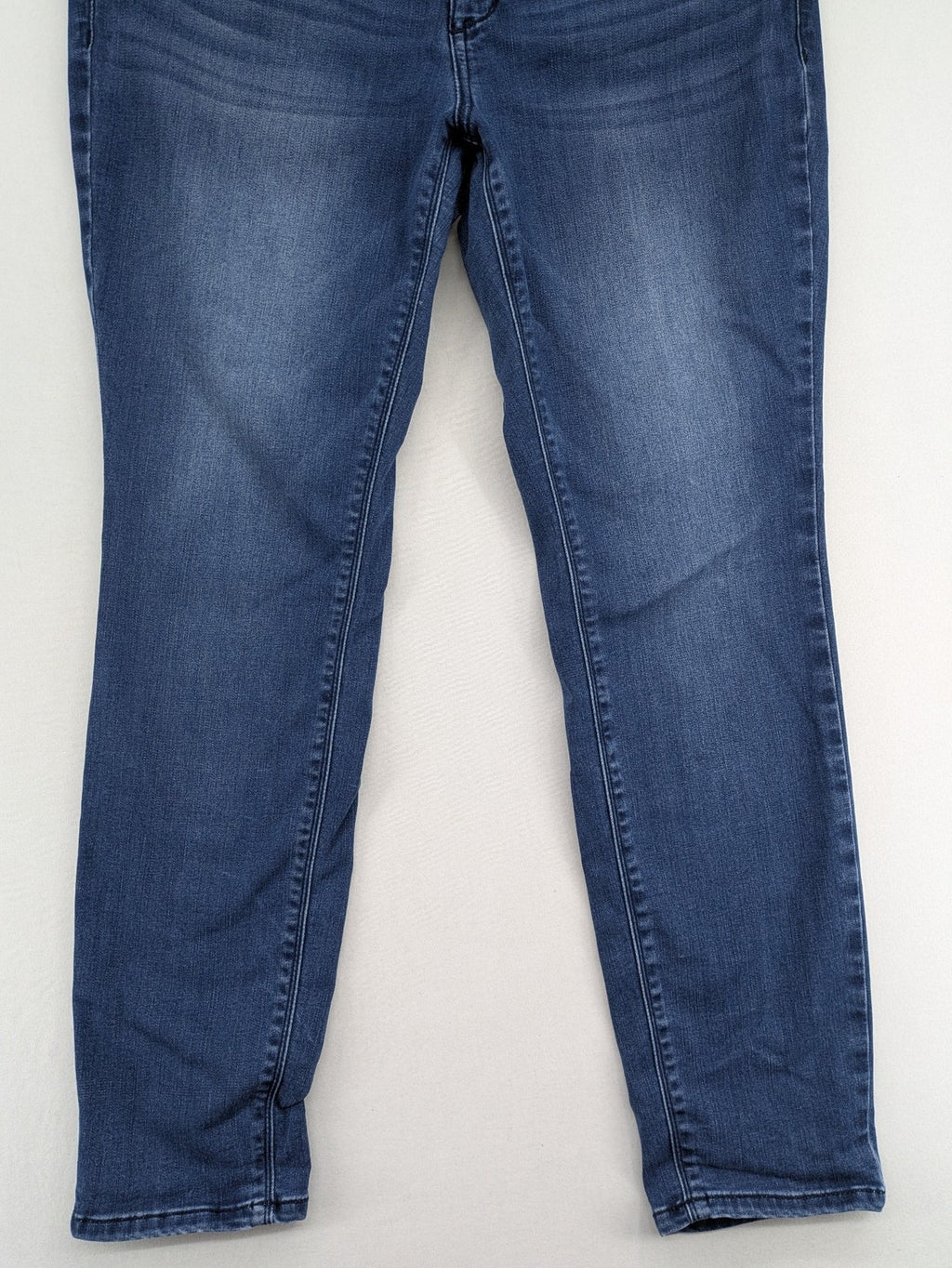 Tom Tailor blue skinny jeans with classic 5-pocket design and double button closure.