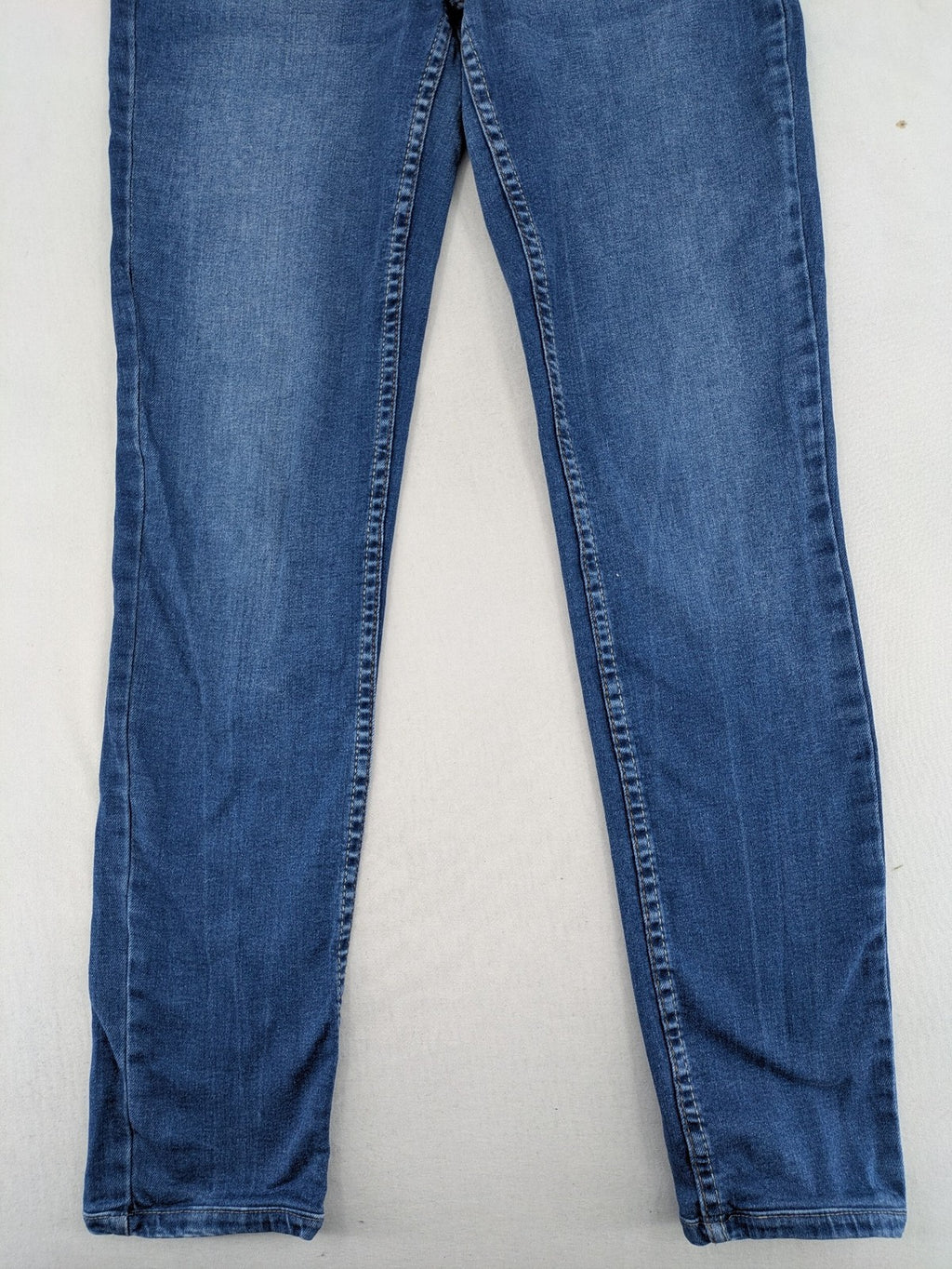 Cecil blue straight jeans with neon green accents and classic 5-pocket design.