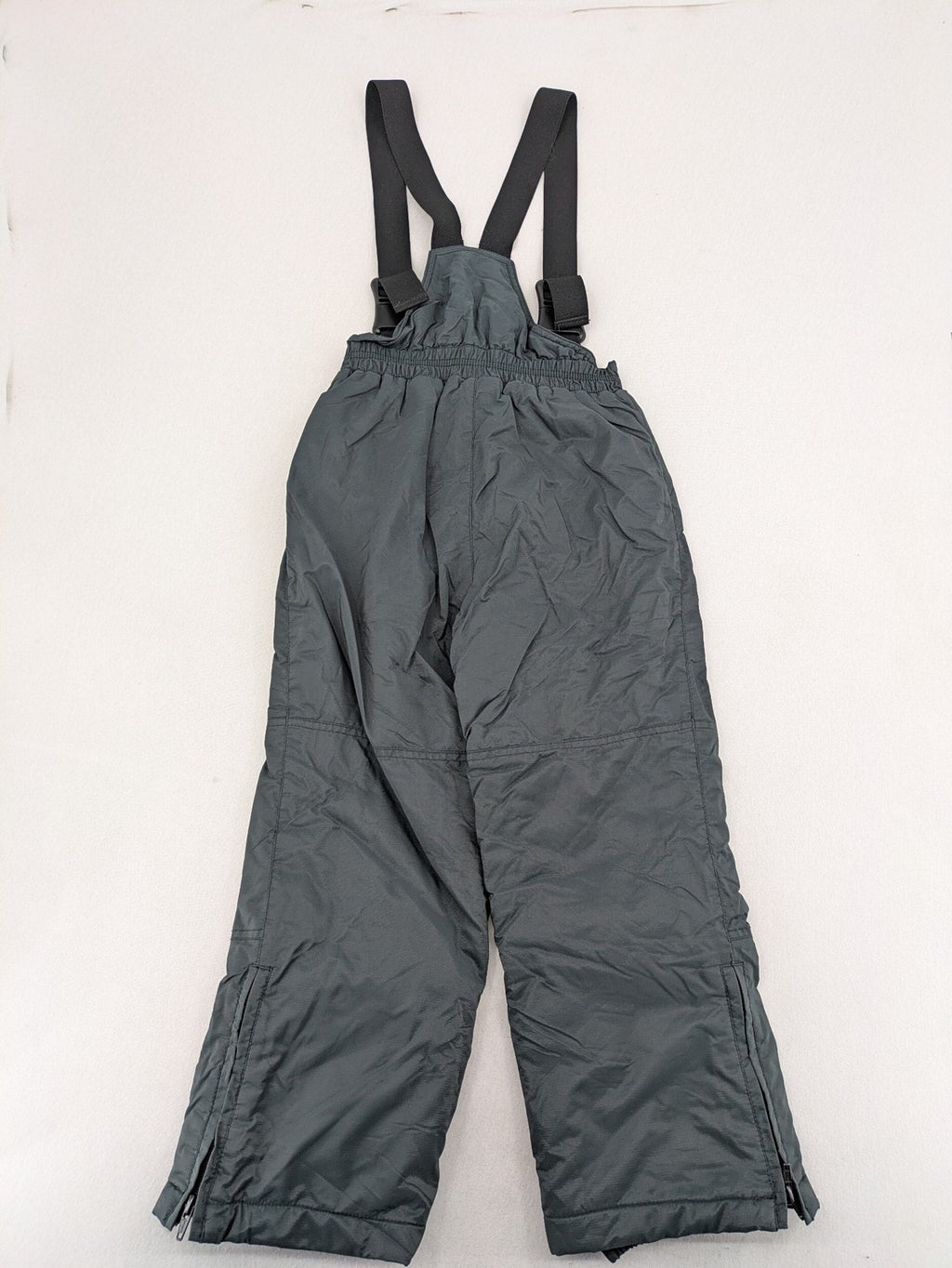 PROLINE grey winter ski pants with adjustable straps and insulated durable material.
