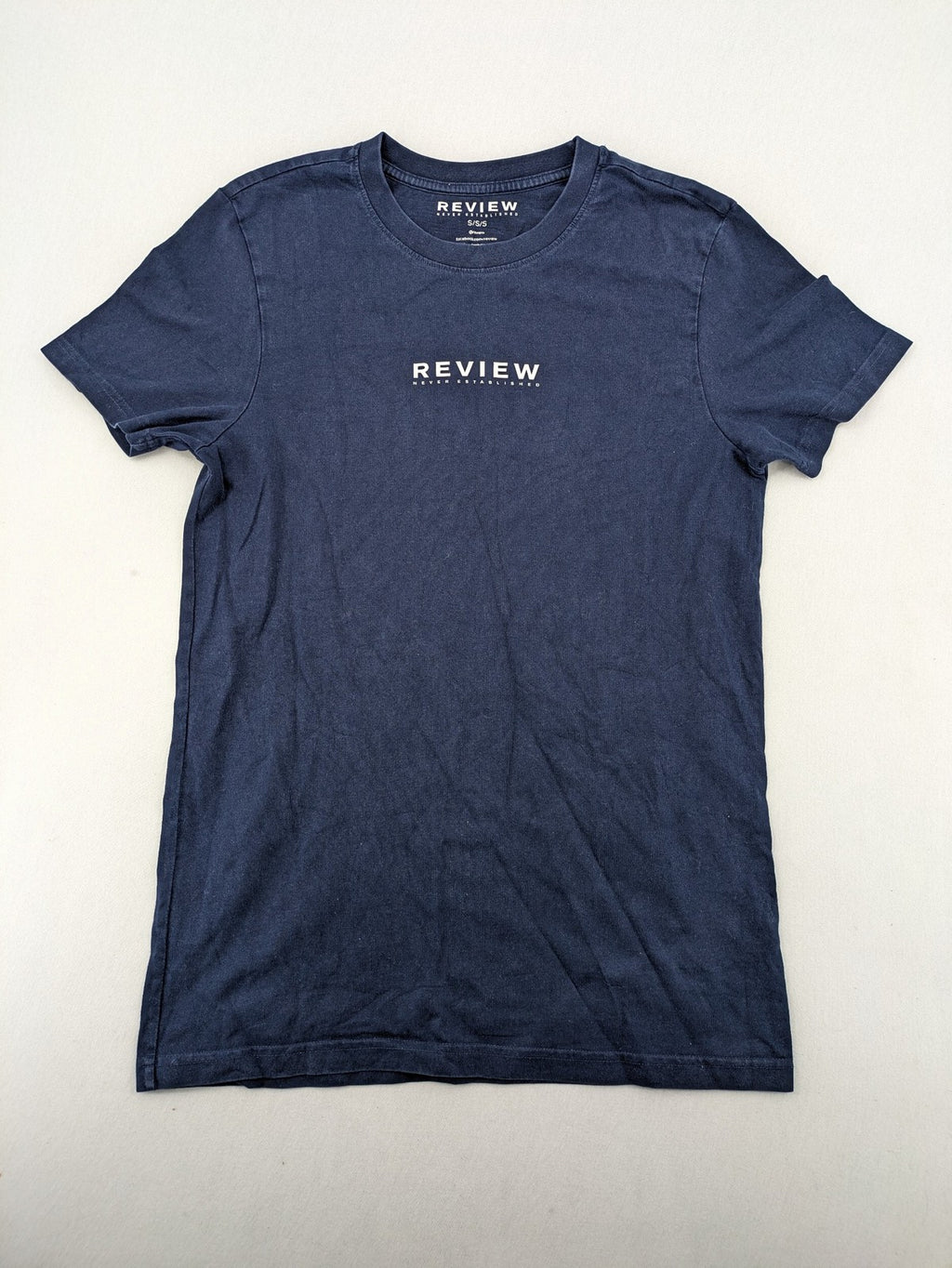 Review navy band t-shirt with "Never Established" logo print, 100% cotton.