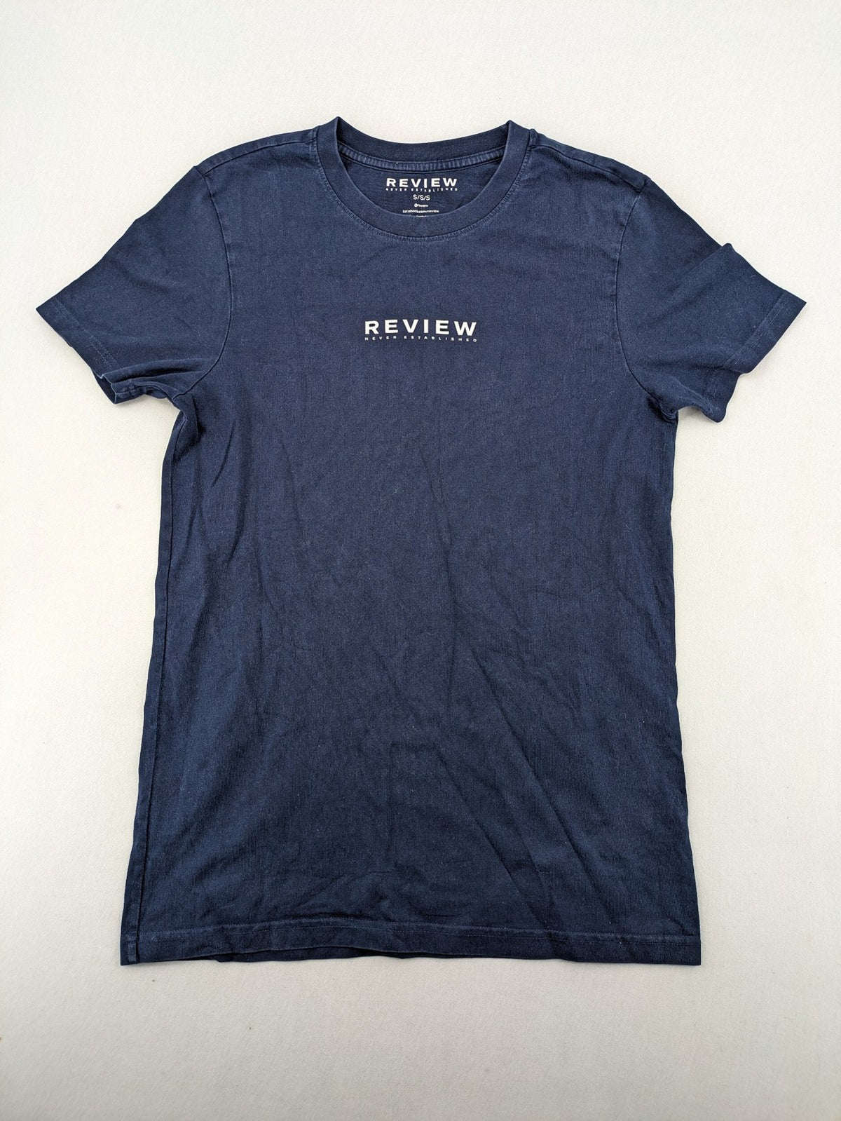 Review navy band t-shirt with "Never Established" logo print, 100% cotton.