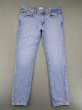 Selected Homme blue slim fit jeans with classic wash and stretch cotton material.