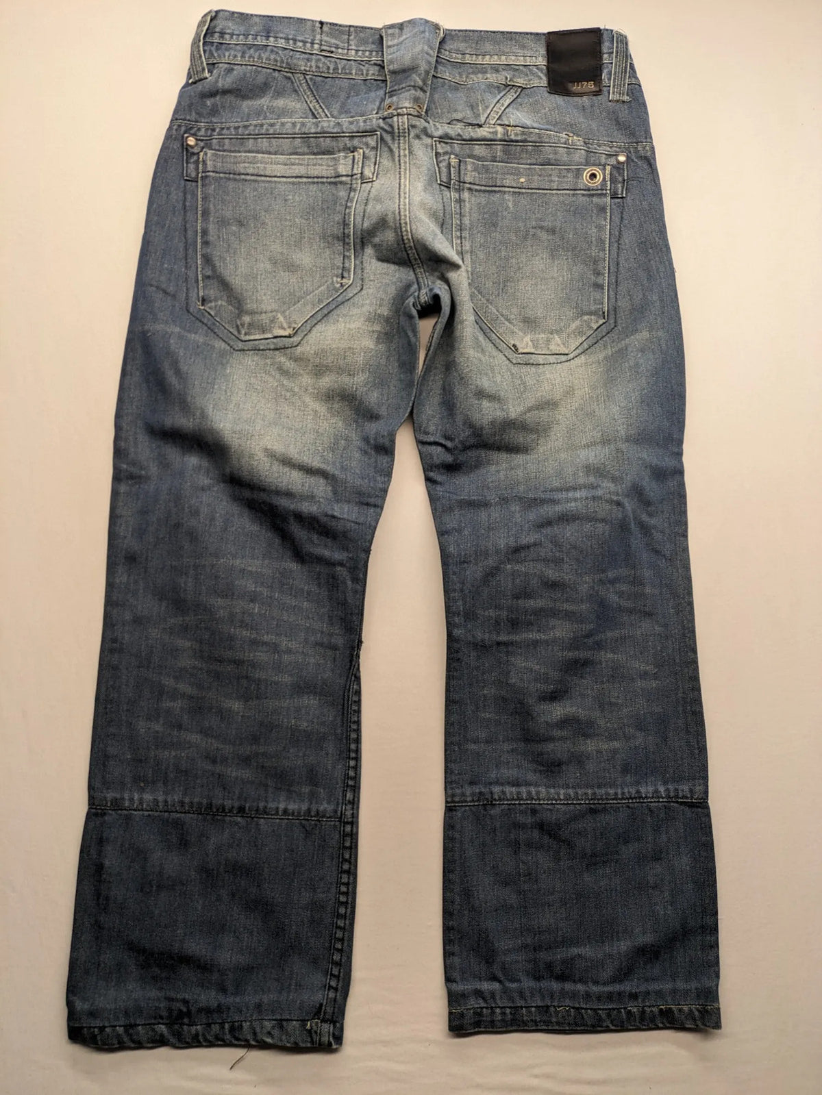 Jack & Jones blue straight jeans with biker panel details and button-fly closure.