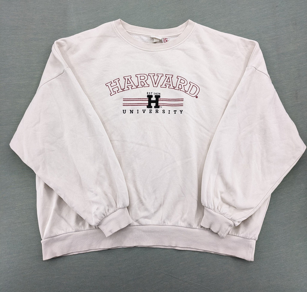 H&M cream turtle neck jumper embroidered Harvard University logo, soft cotton blend.