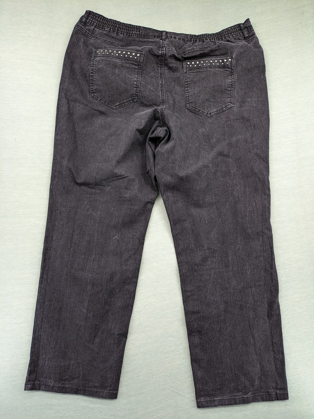 Charles Vögele grey straight jeans with elastic waistband and decorative studs on pockets.