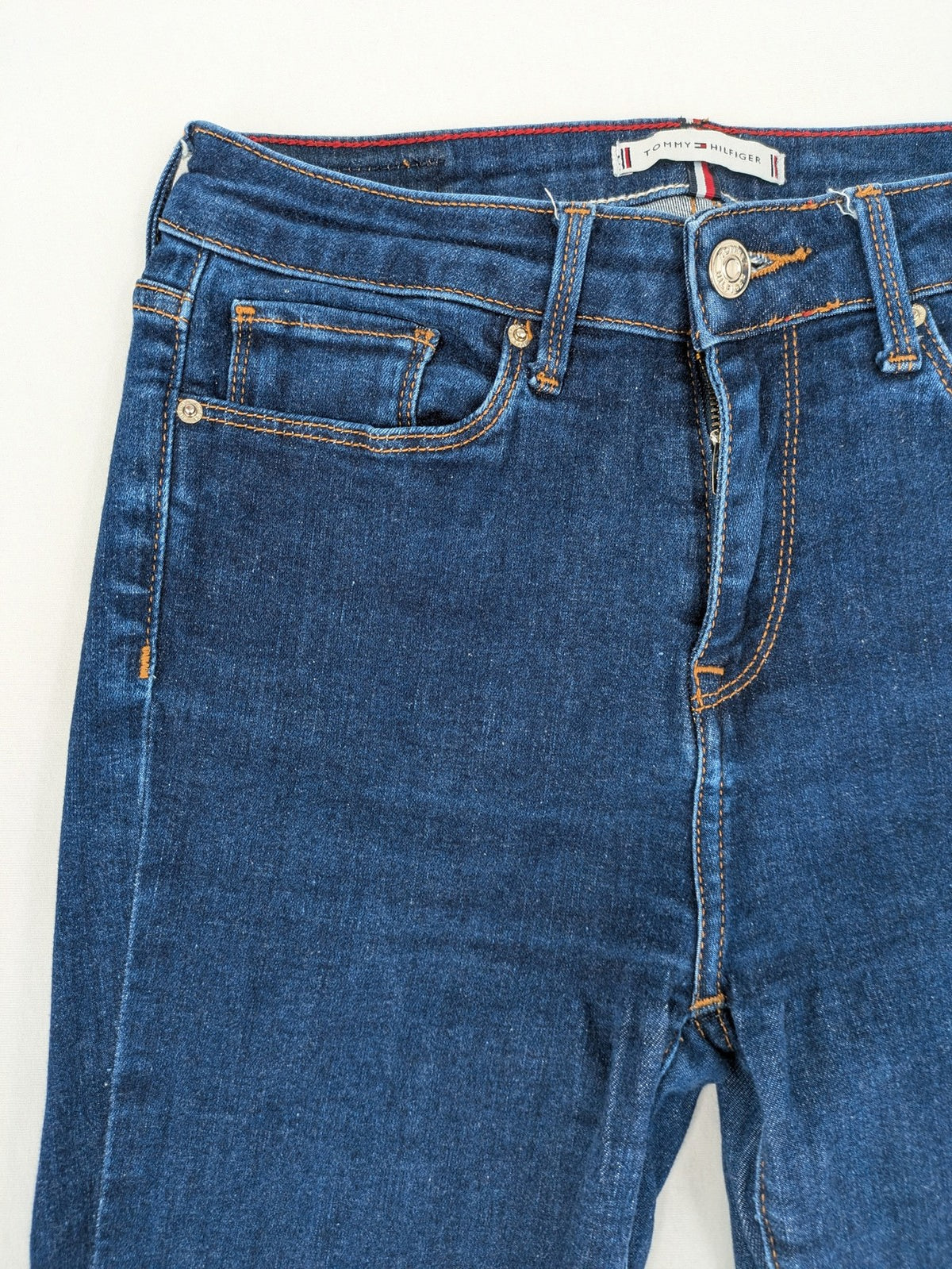 Tommy Hilfiger blue skinny jeans, five-pocket design, made from organic cotton blend.