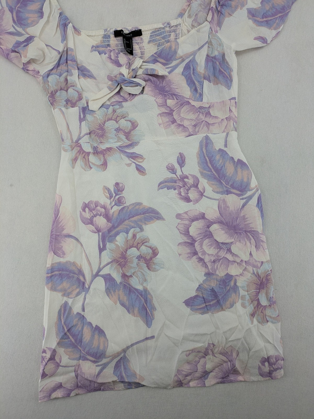 Forever 21 women's midi dress white with blue and purple floral pattern, smocked bodice, puff sleeves.