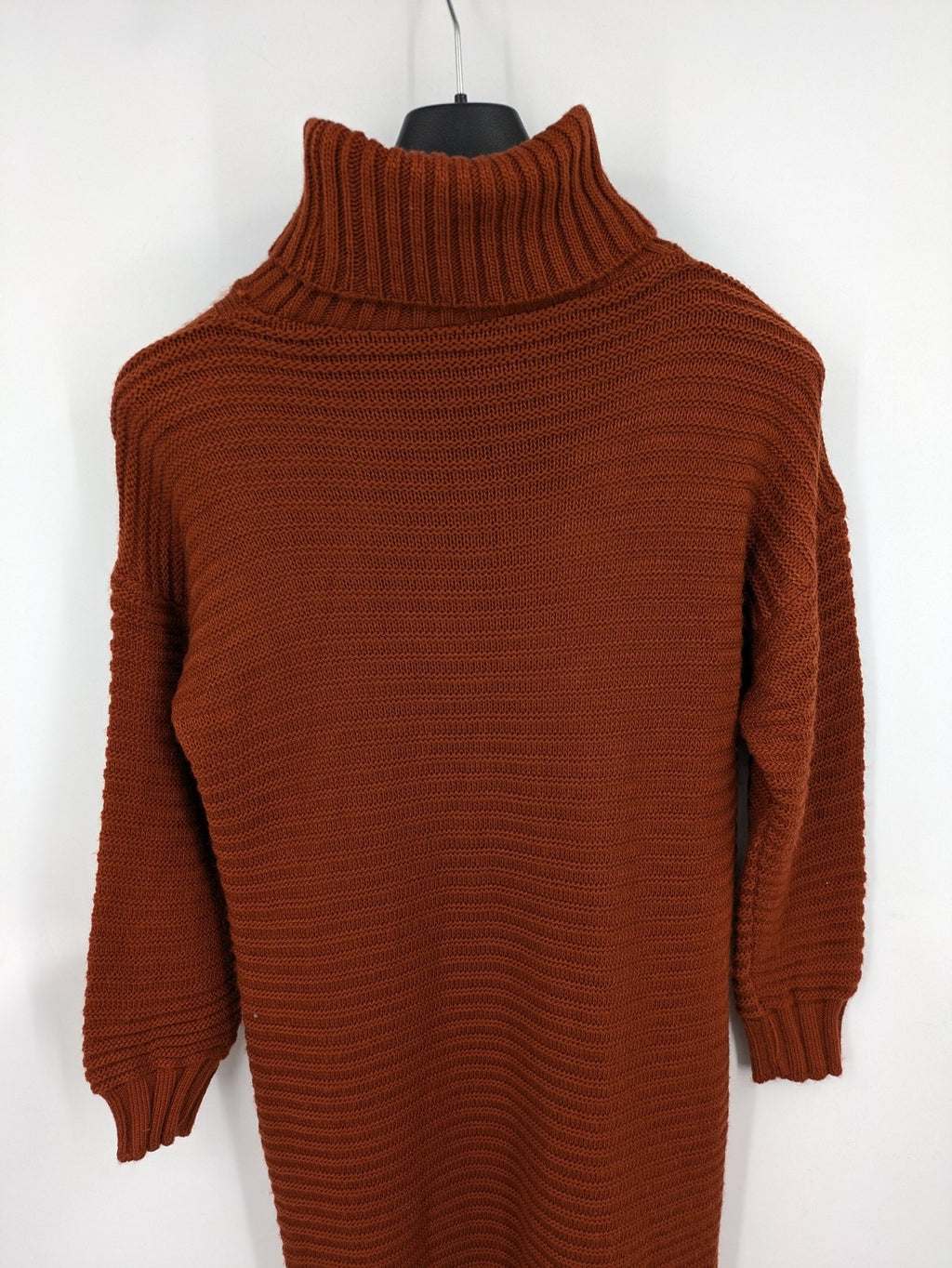 Braun brown turtle neck jumper with decorative cable knit pattern and long sleeves.