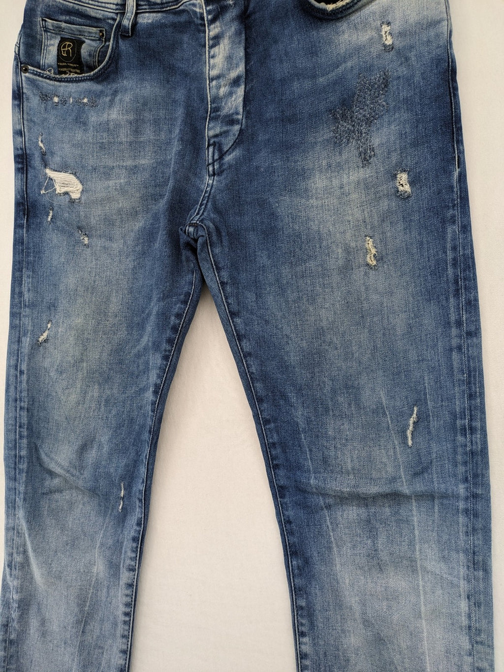 W32 blue straight jeans distressed details tapered fit button fly design