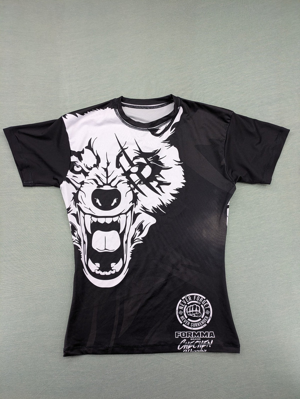 FORMMMA black rashguard featuring striking white wolf graphic and "Chechen Warrior" text.