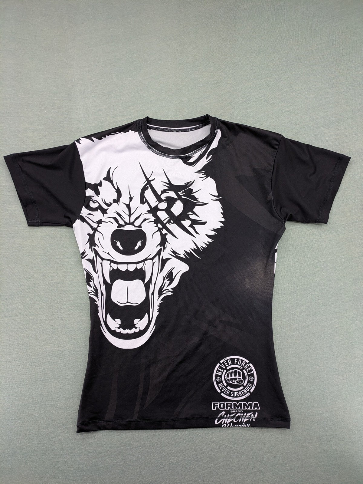 FORMMMA black rashguard featuring striking white wolf graphic and "Chechen Warrior" text.