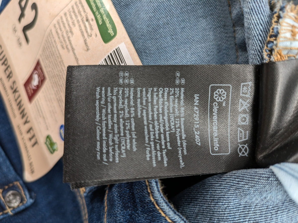 ESMARA blue super skinny jeans with dark wash and stretch denim material.