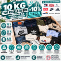 ALS navy apparel box with assorted secondhand fashion items for men and women.