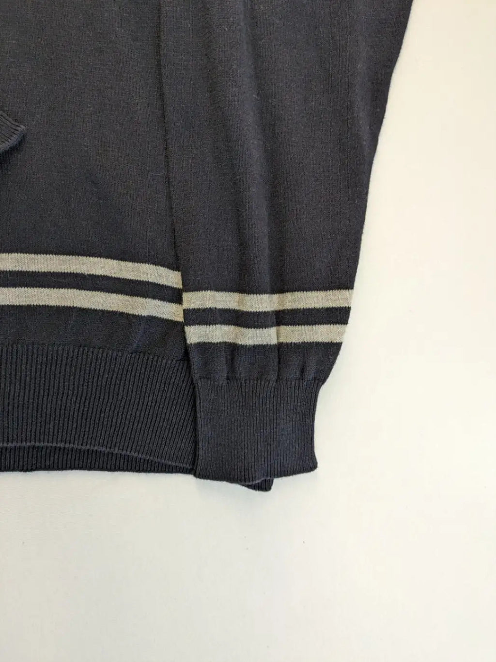 dunmore turtle neck jumper dark blue with striped trims and embroidered crest logo