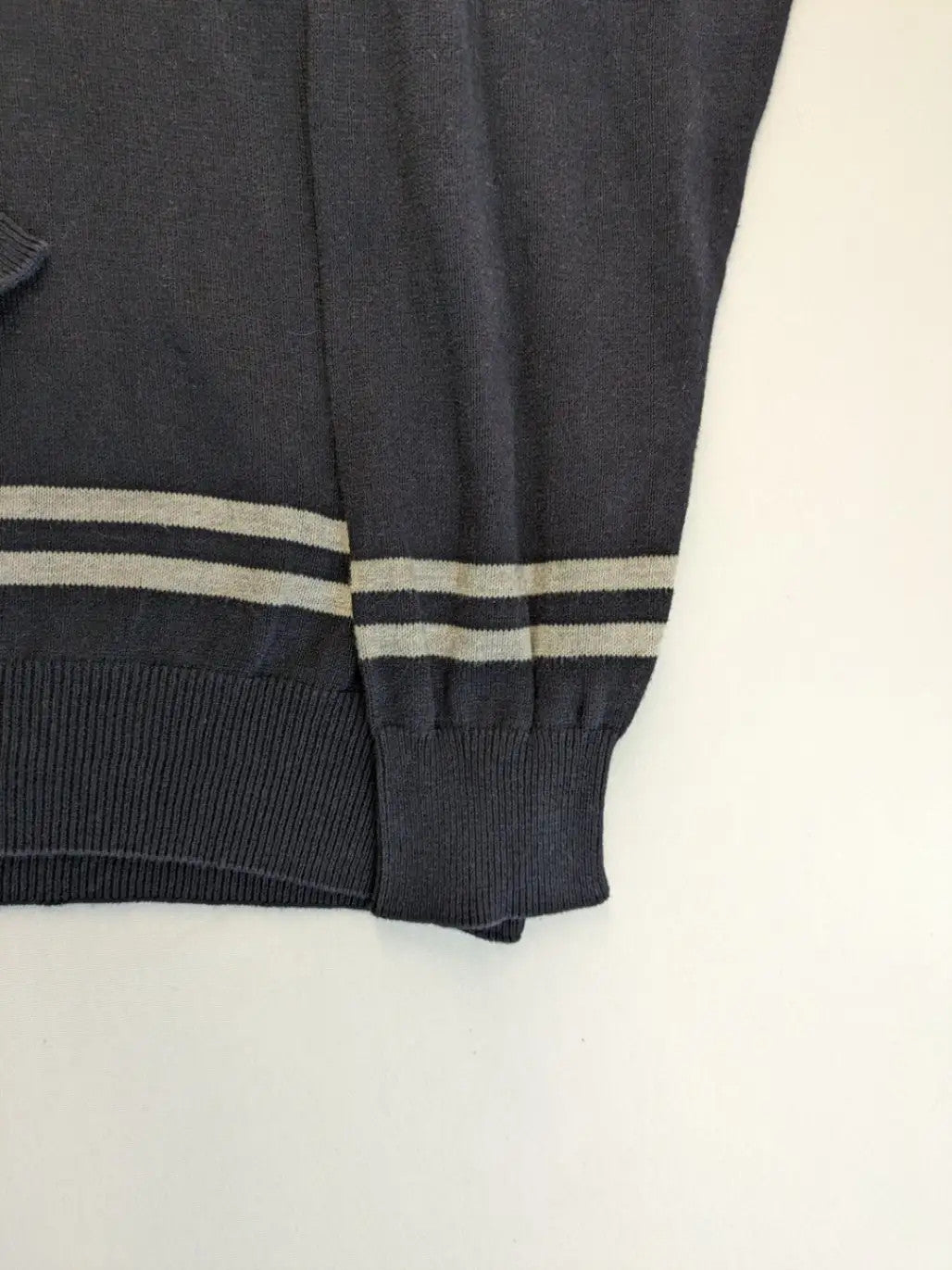 dunmore turtle neck jumper dark blue with striped trims and embroidered crest logo
