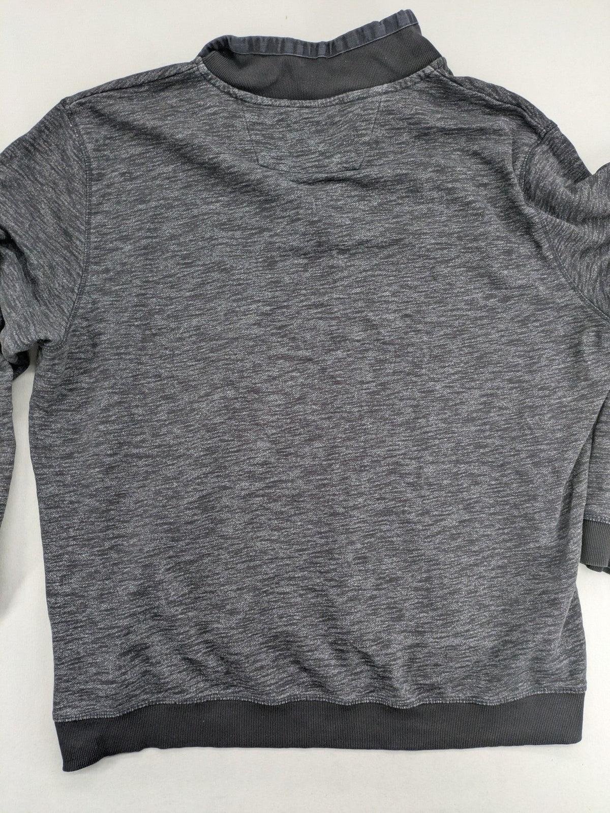 Straight Up grey turtle neck jumper with zip collar and subtle graphic print.