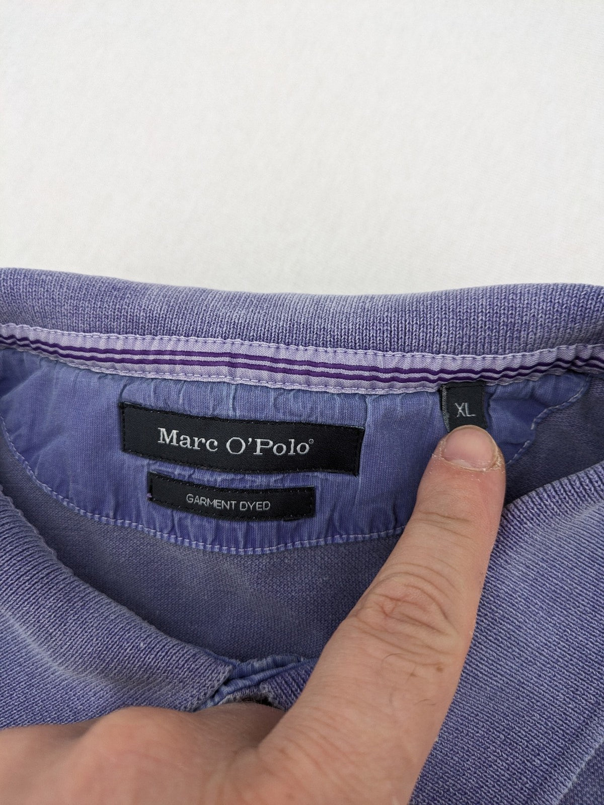 Marc O'Polo purple polo shirt garment dyed cotton with embroidered logo and intricate details.
