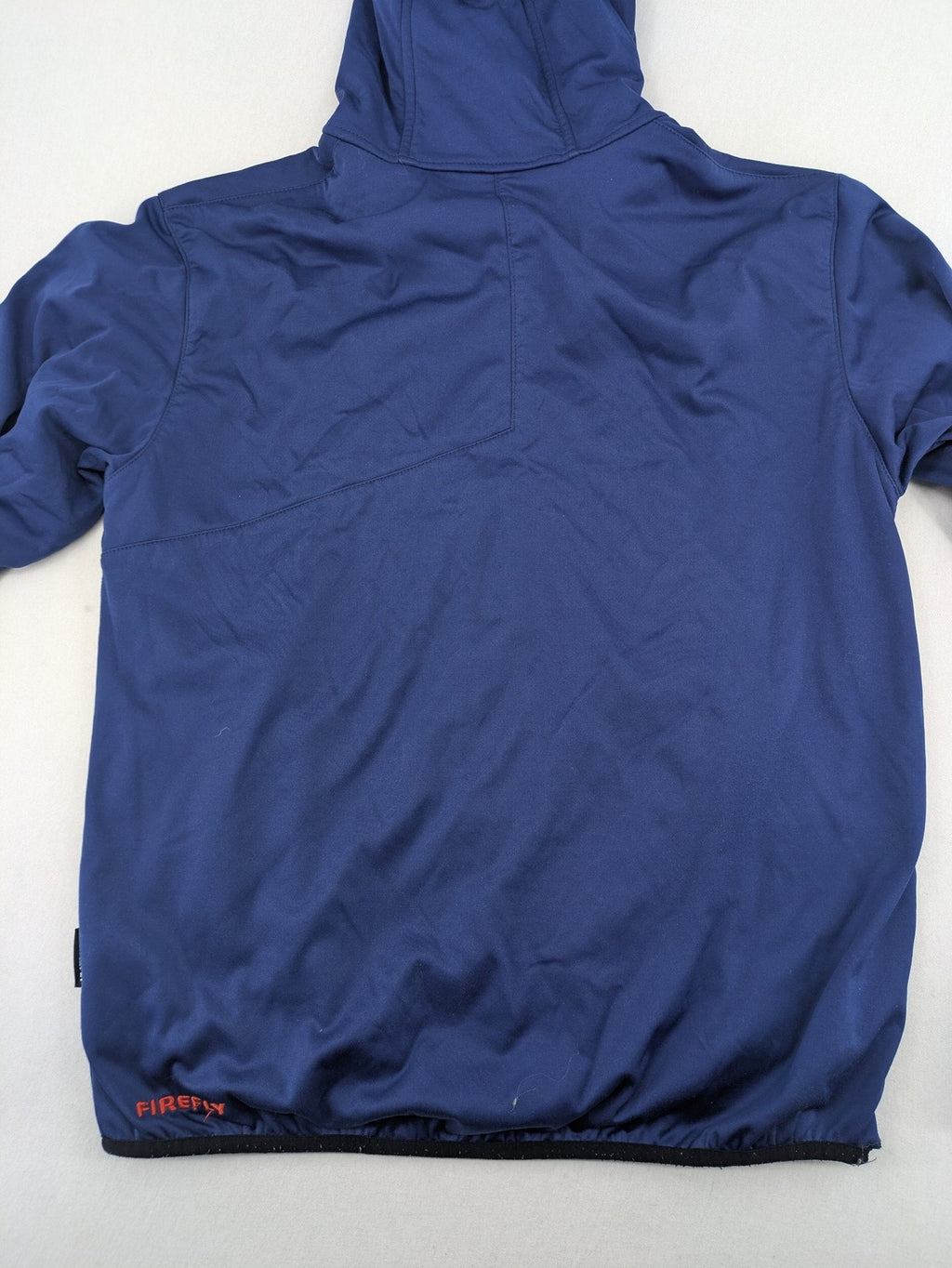 Firefly blue softshell jacket with adjustable hood and prominent chest logo.