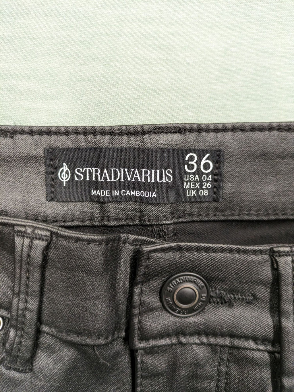 Stradivarius black coated skinny jeans faux leather finish stylish silhouette