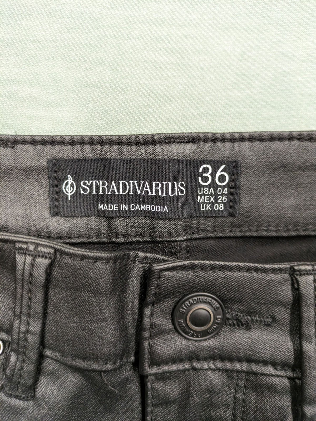 Stradivarius black coated skinny jeans faux leather finish stylish silhouette