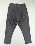 Jenny Joy pink harem pants with pleats, side pockets, and tapered legs.