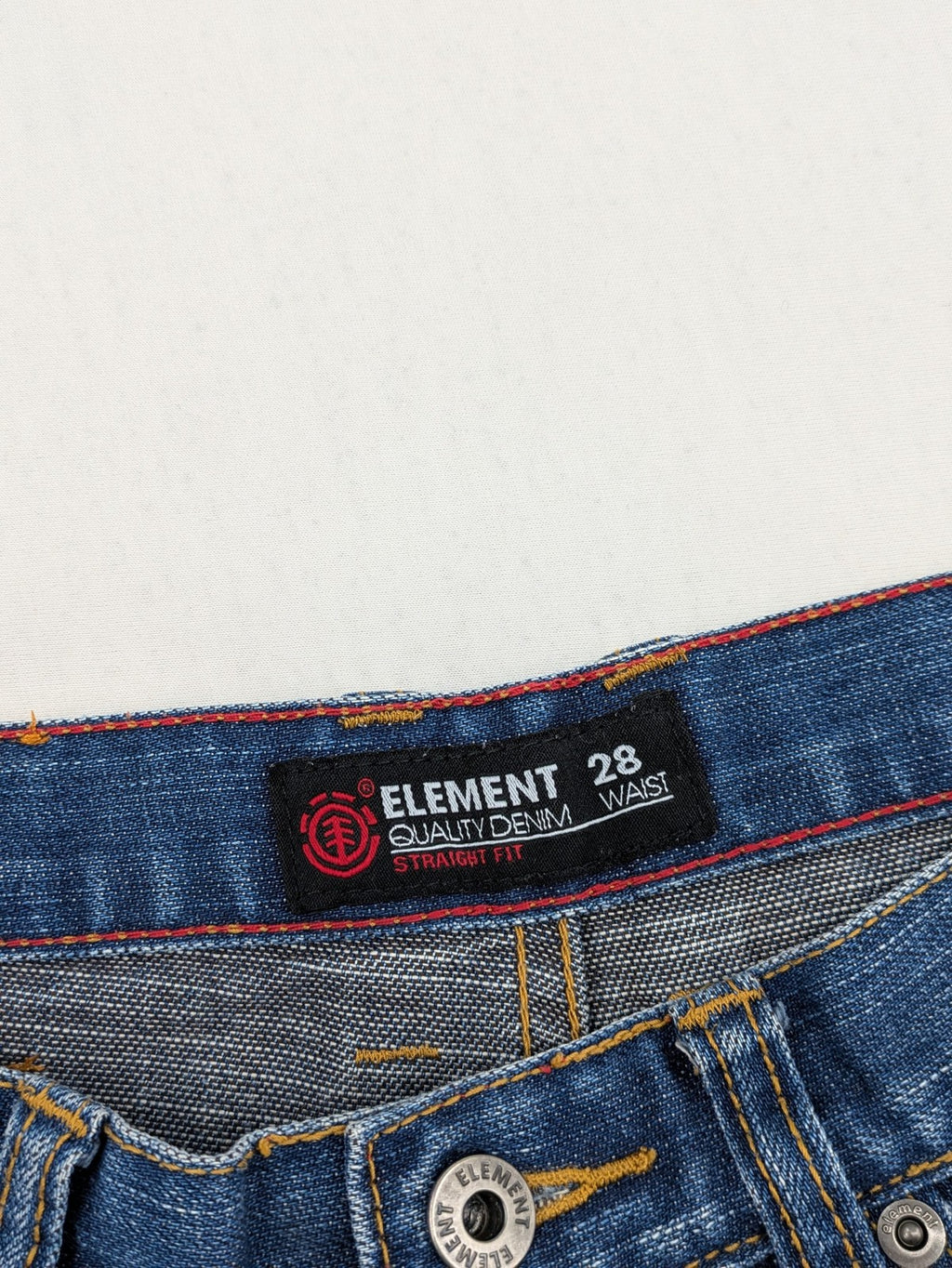 Element blue straight jeans with classic button fly and 5-pocket design.