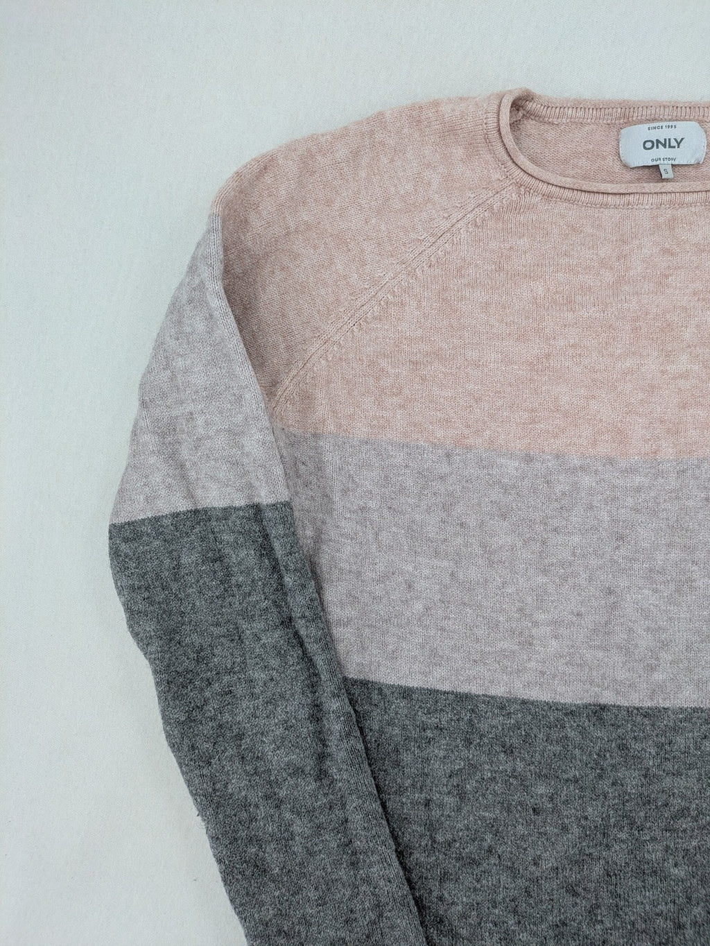 Only turtle neck jumper grey and orange colorblock design with long sleeves and round neckline.