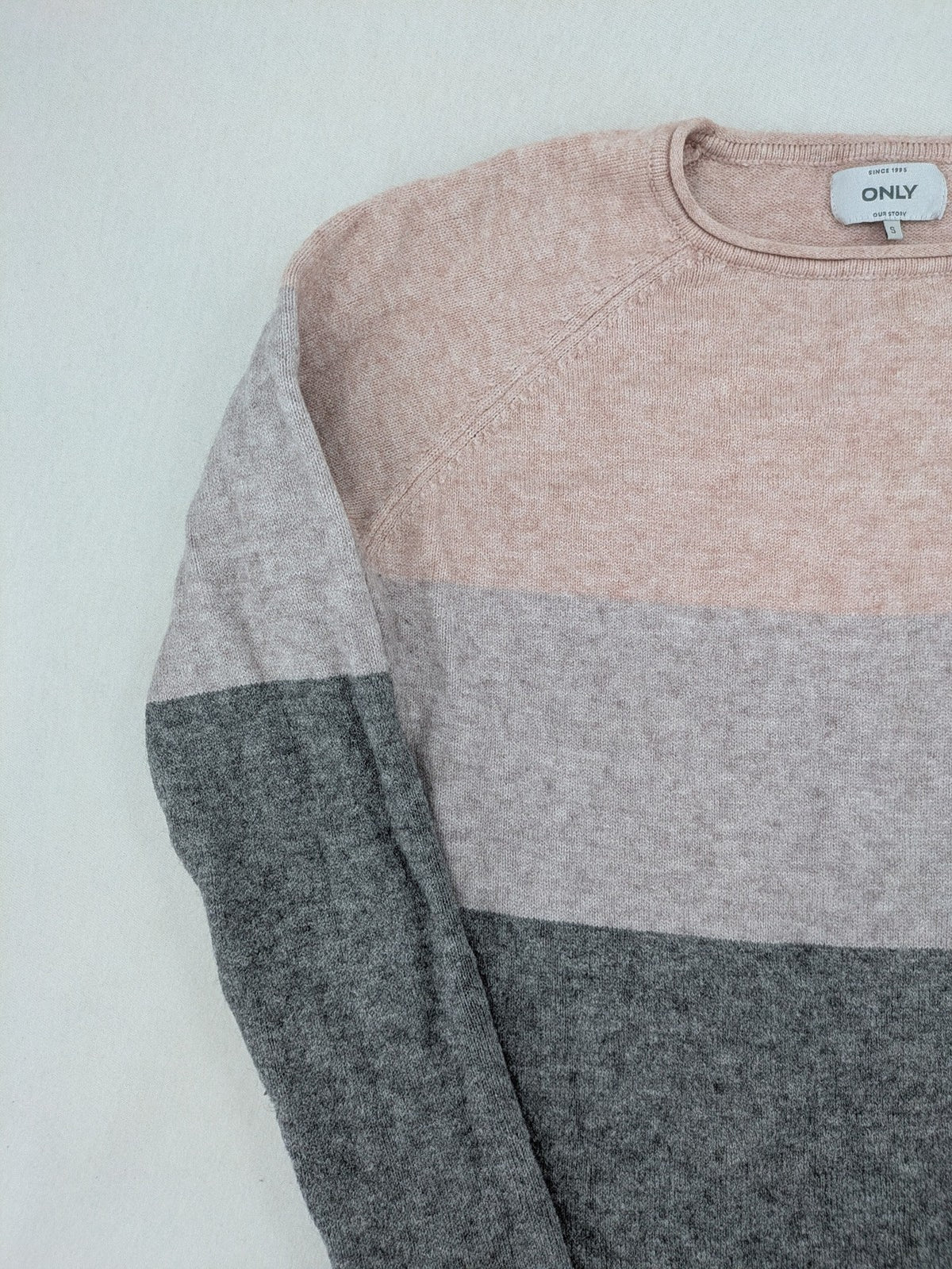 Only turtle neck jumper grey and orange colorblock design with long sleeves and round neckline.