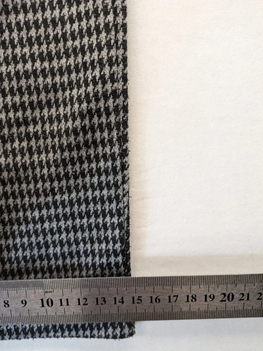 UP2FASHION beige and brown houndstooth pants with adjustable drawstring and soft stretch material.