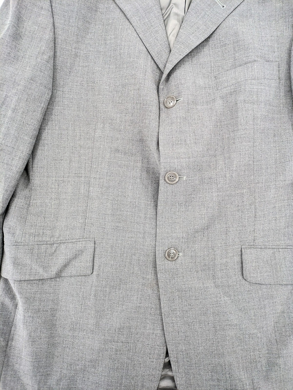Montego grey blazer three-button design made from wool blend with smooth lining.