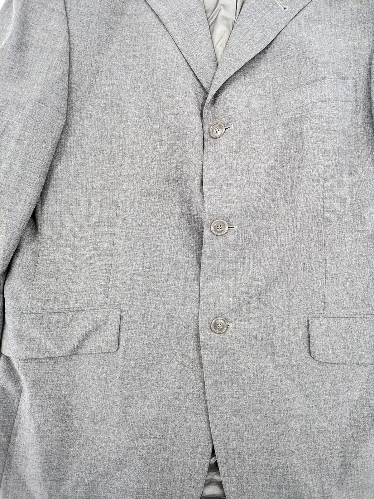 Montego grey blazer three-button design made from wool blend with smooth lining.