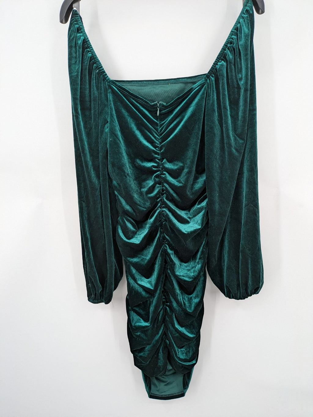 SHEIN green bodycon dress with ruched details, square neckline, and long puff sleeves.
