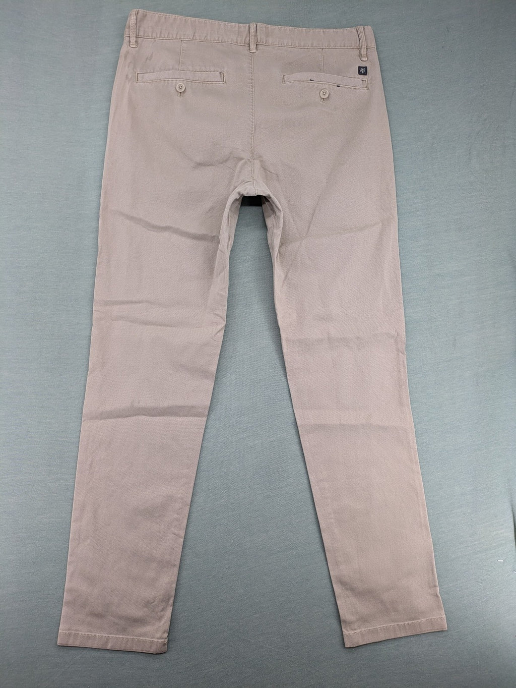 Marc O'Polo beige tapered fit chino pants, soft cotton stretch fabric, modern silhouette.
