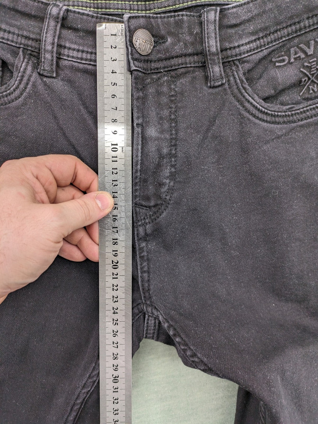 Savvy black straight jeans with washed finish and slim fit, made from stretch denim.