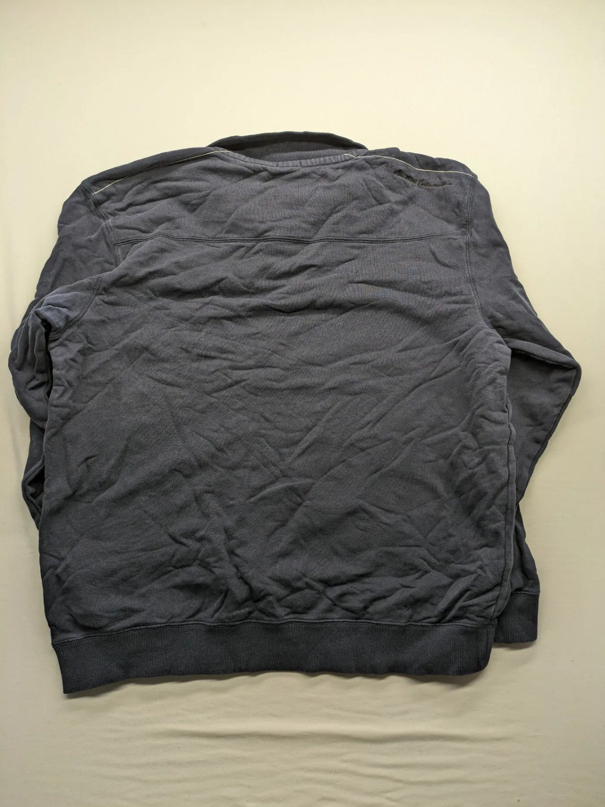 Lerros blue turtle neck jumper with stitched 'British Columbia' detail and button accents.