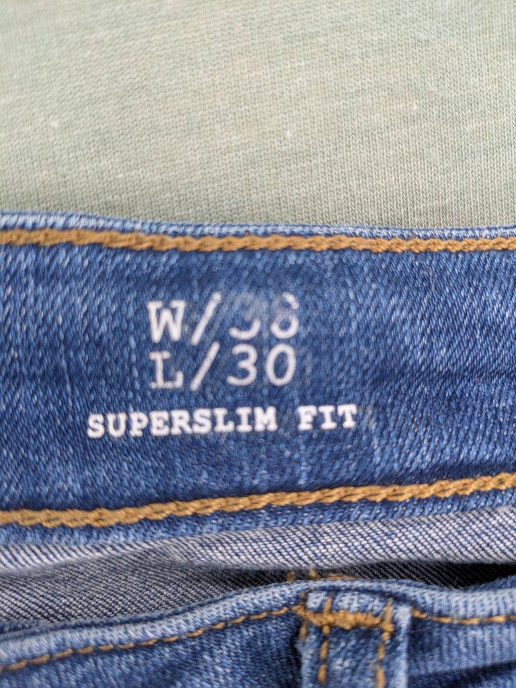 Q/S blue superslim fit jeans with classic 5-pocket style and zipper detail.