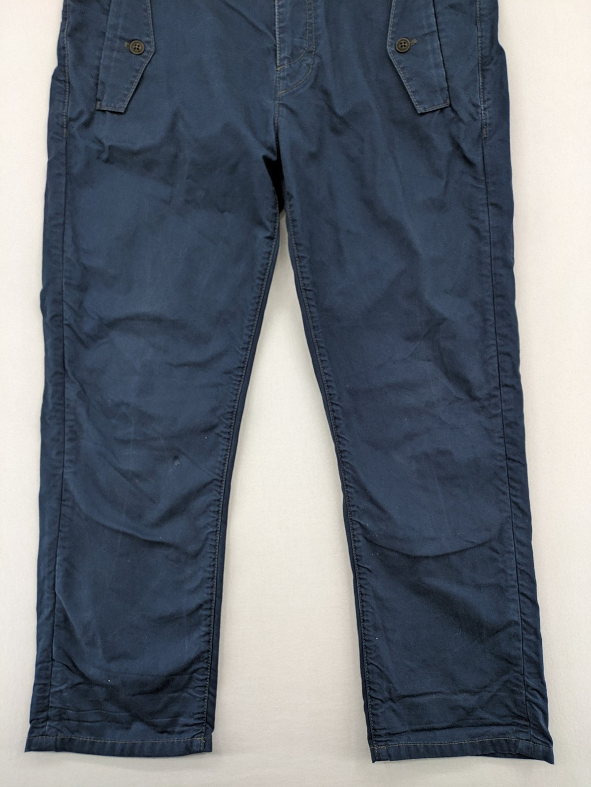 Marc O'Polo blue chino pants with button flap pockets and relaxed fit design.