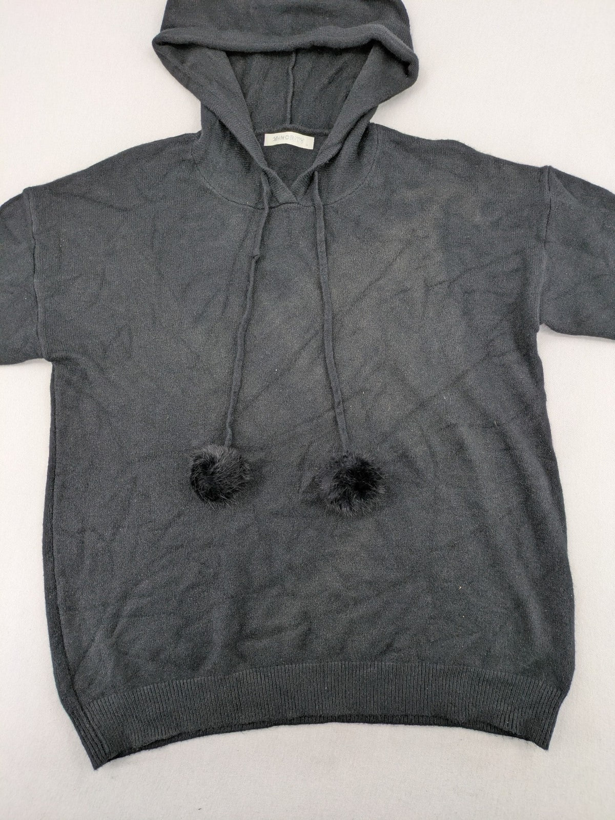 M/L grey hoodie with playful pom-poms and soft viscose blend material.