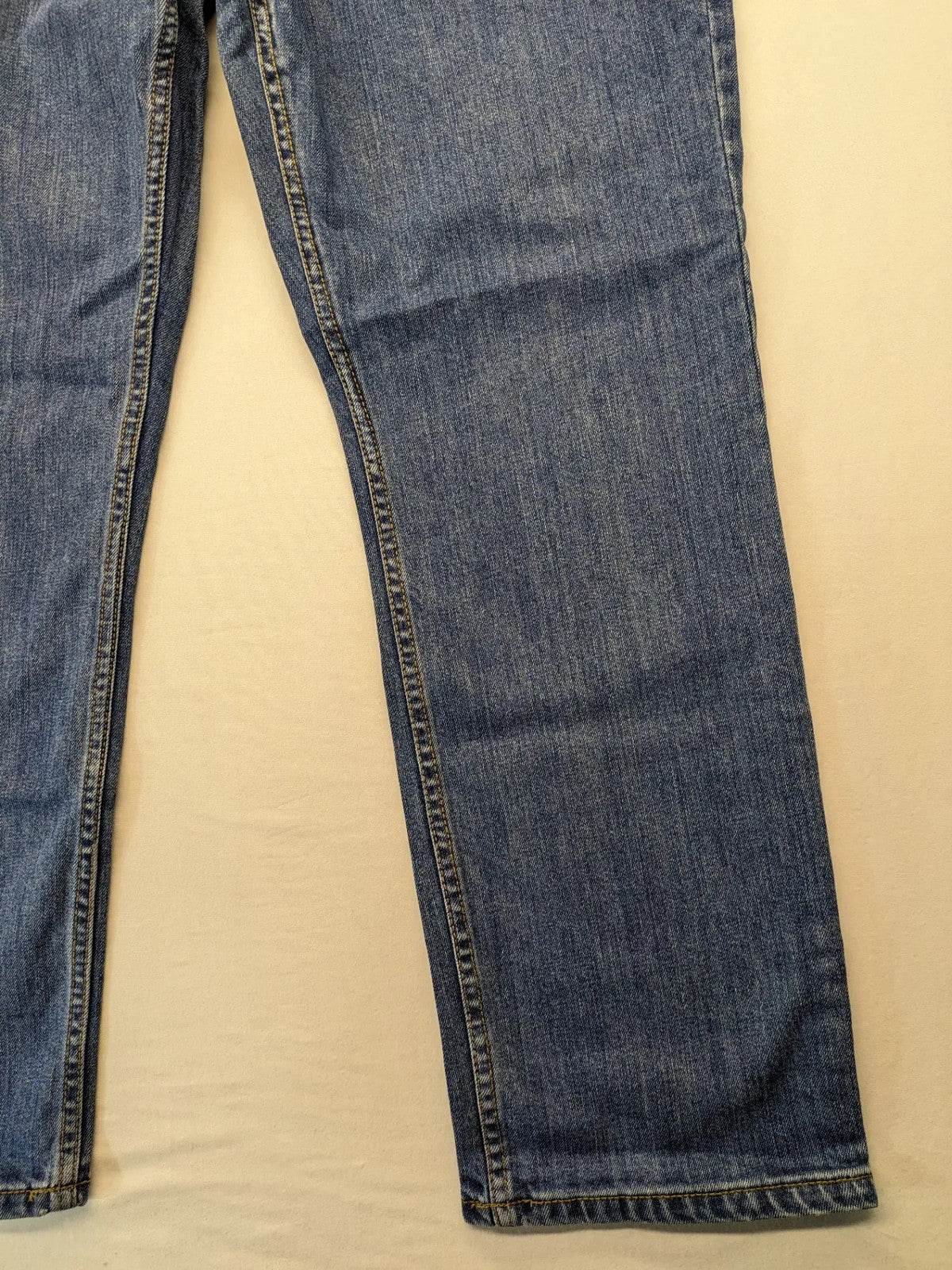 Hero By John Meddox blue straight jeans with five-pocket design and zip fly.