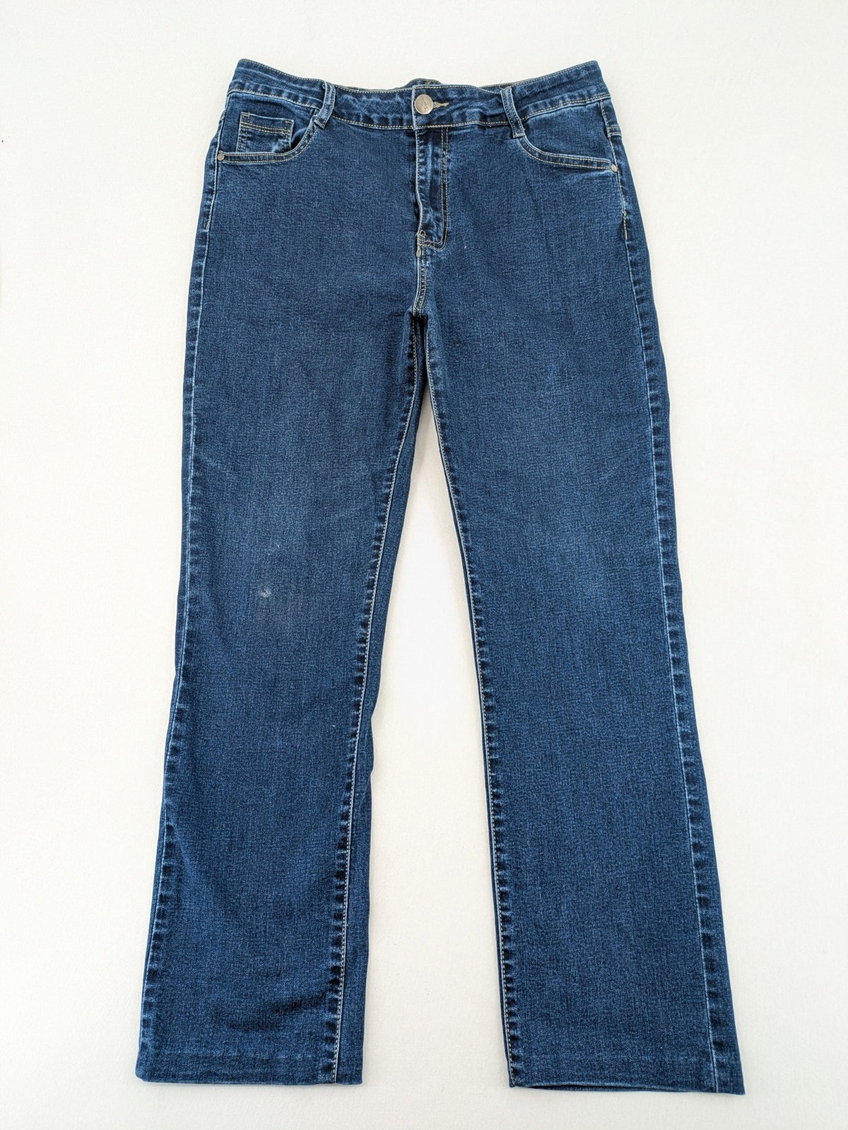 Miss Good blue straight jeans with 5-pocket design and decorative metal accent.