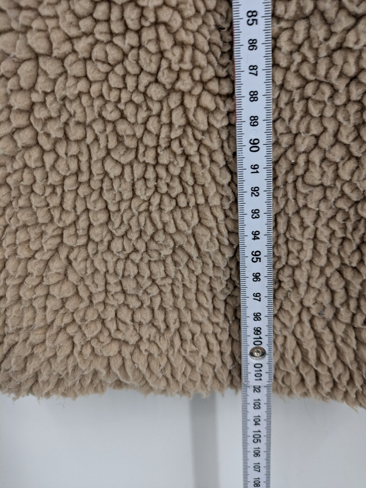 Clockhouse beige teddy coat longline design soft faux fur material with notched collar.
