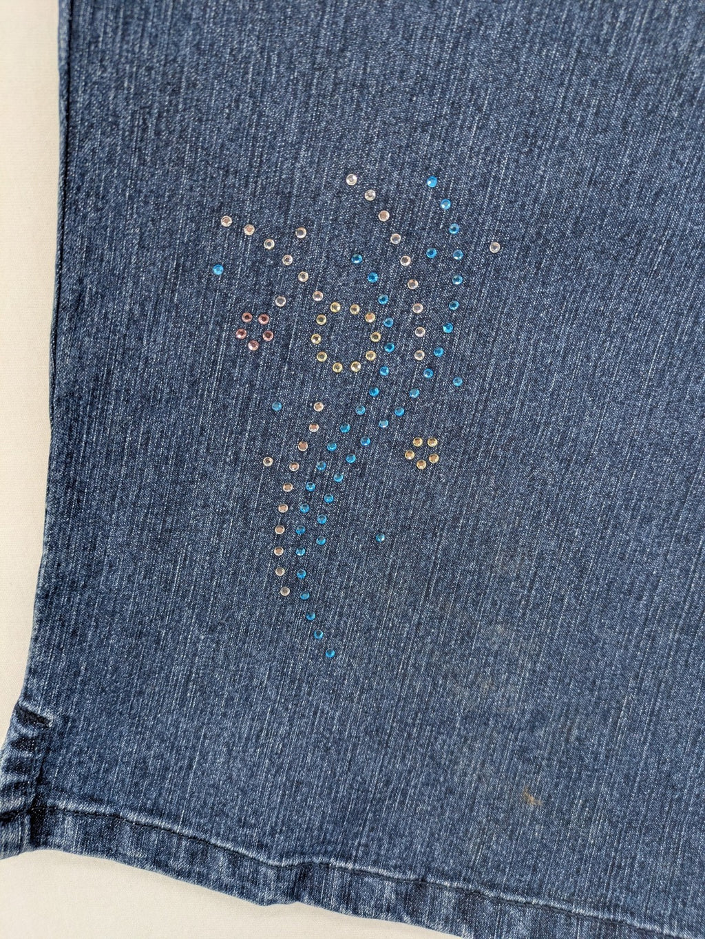 Denim & Co. blue capri jeans with elastic waistband and embellished rhinestones.