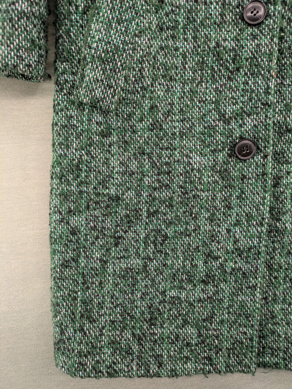 Esprit green black white tweed coat with notch collar and three-button closure.