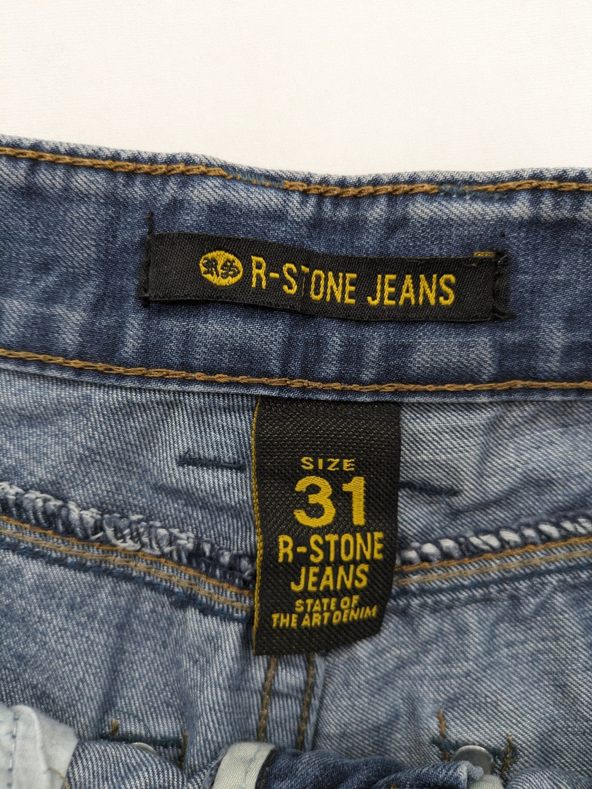 R-Stone Jeans blue straight leg denim with washed effect and "Fashion Wear" embroidery.