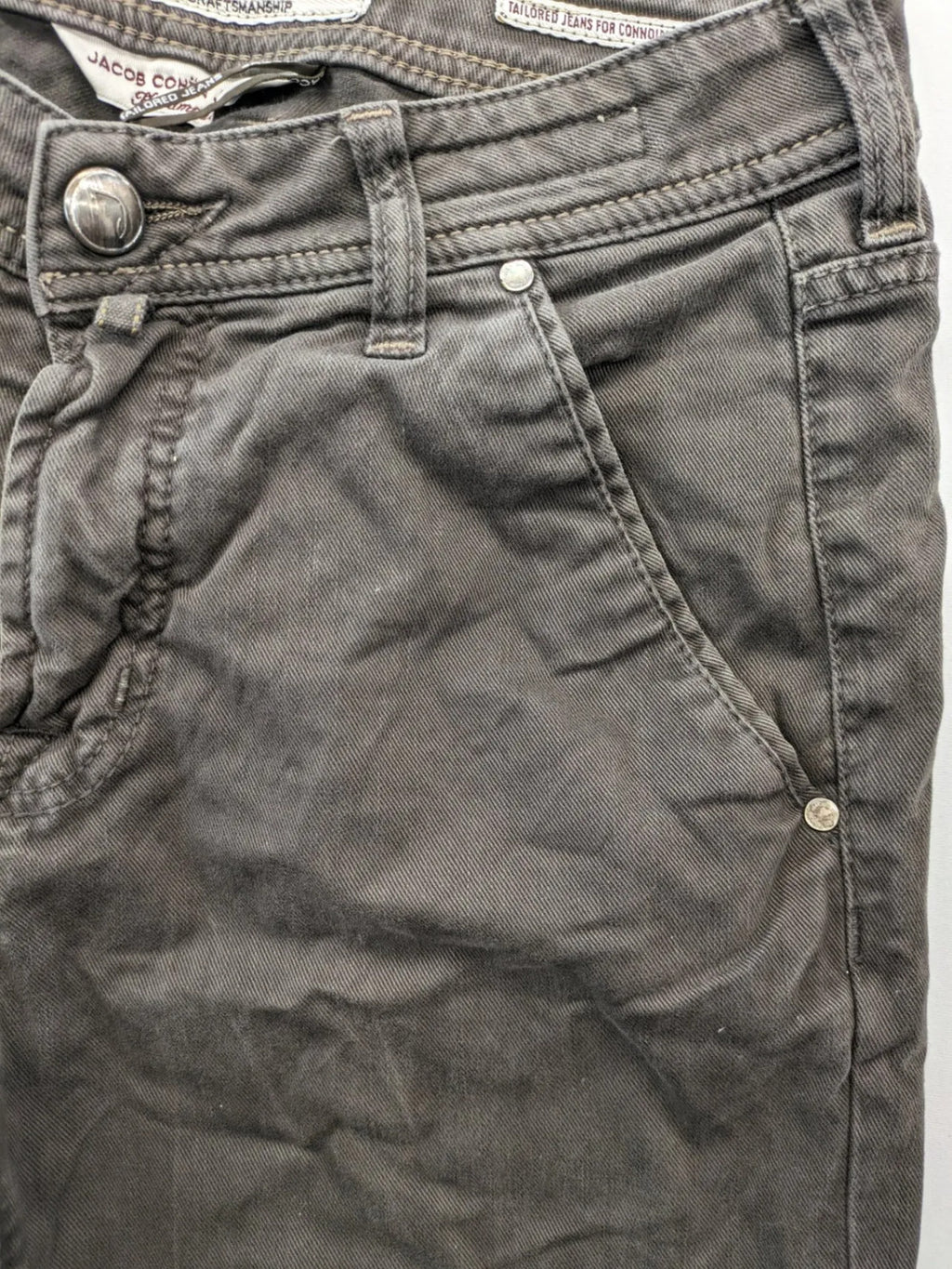 Jacob Cohen black straight jeans with leather logo patch and zip fly, size 32.