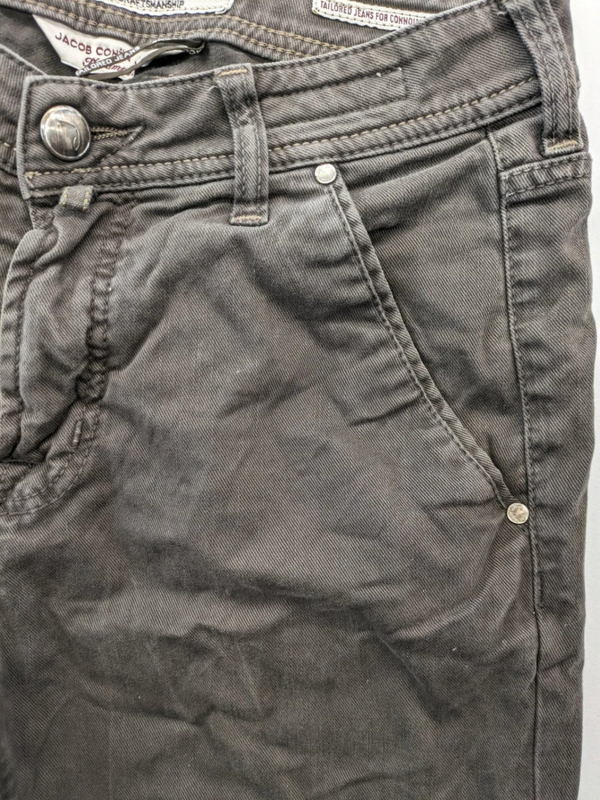 Jacob Cohen black straight jeans with leather logo patch and zip fly, size 32.