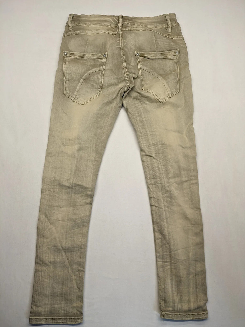 Mozaar beige straight jeans with unique asymmetrical button placket and practical pockets.