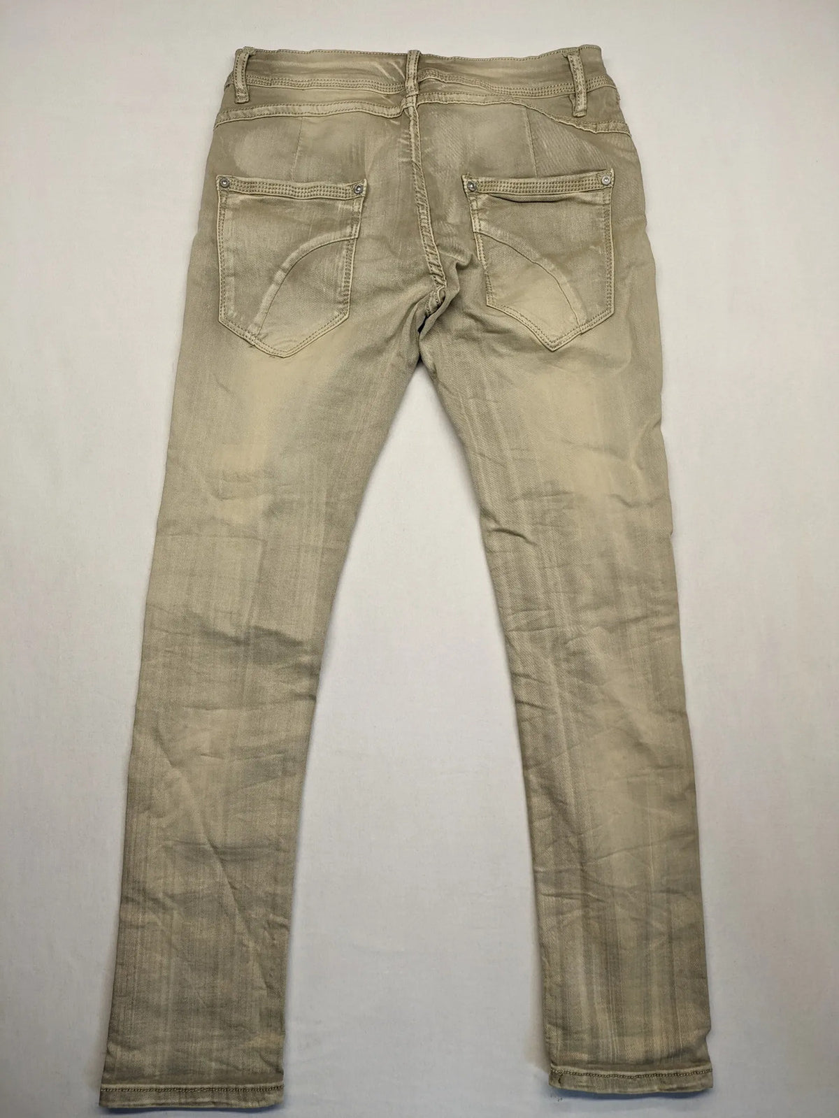Mozaar beige straight jeans with unique asymmetrical button placket and practical pockets.
